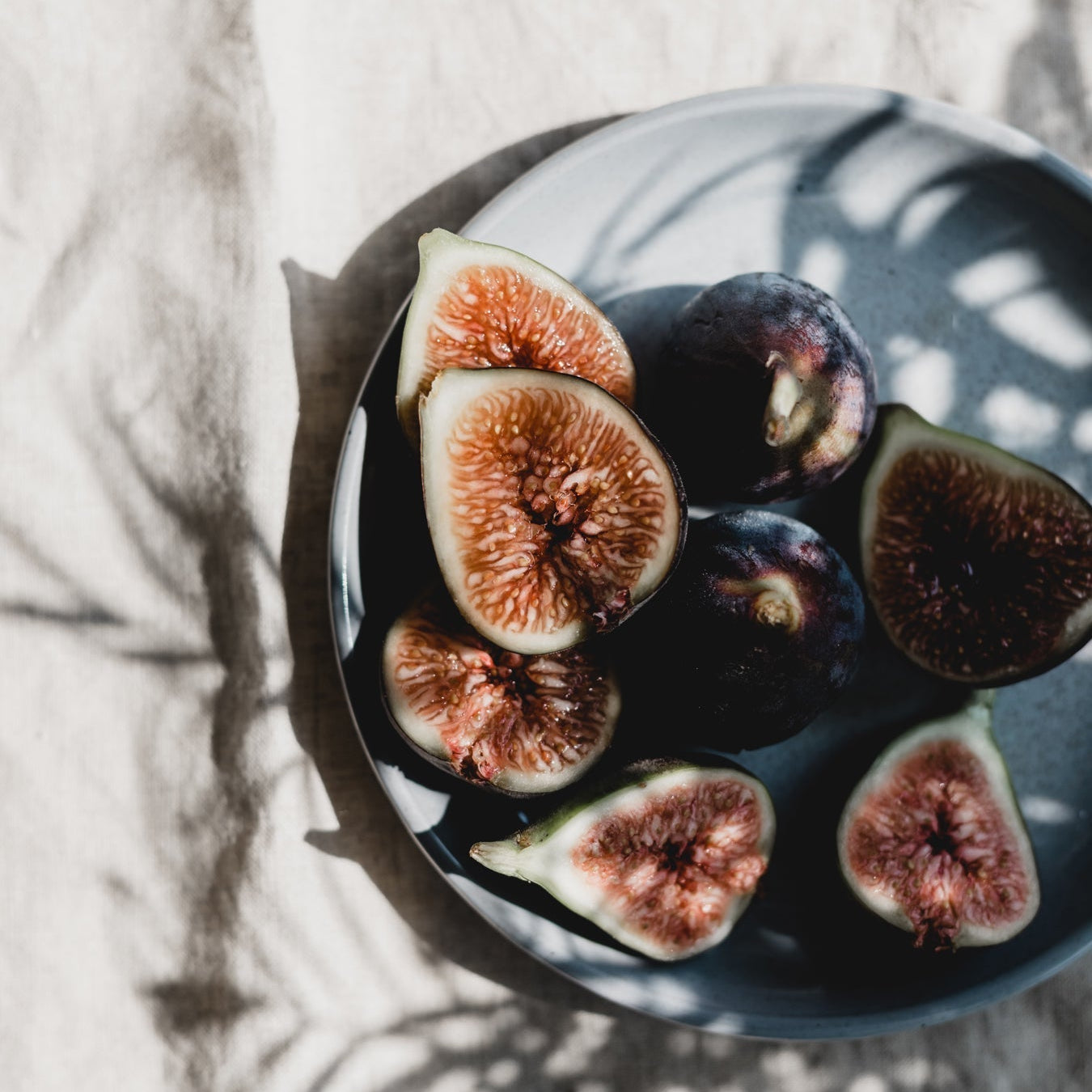 Cooking with fresh figs on a platter 